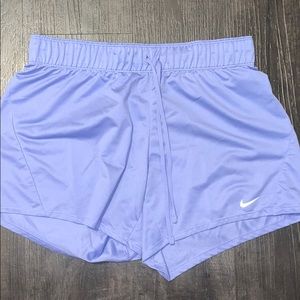 Purple Nike shorts